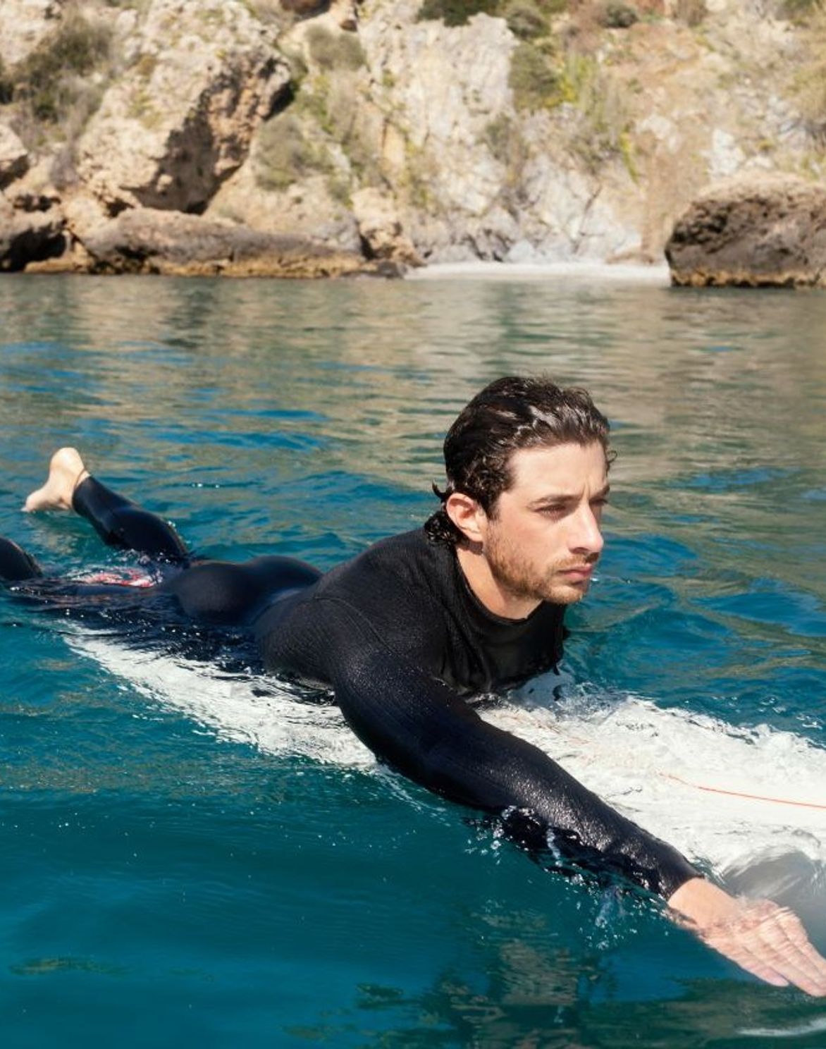 new student paddling in the water